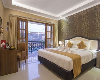 بريما إن هوتل ماليوبورو - يوغياخيرتا - غرفة نوم