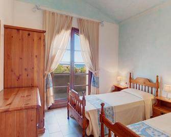 Le Residenze di Piazza Italia - Costa Rei - Habitación