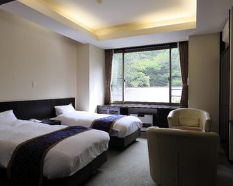 Okushiobara Kogen Hotel - נאסושיוברה - חדר שינה