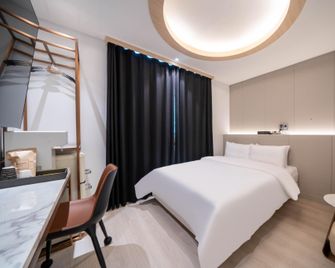 Asan Hotel Pognan Asan Branch - Asan - Camera da letto