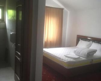 Hotel Ostrov - Calimanesti Caciulata - Bedroom