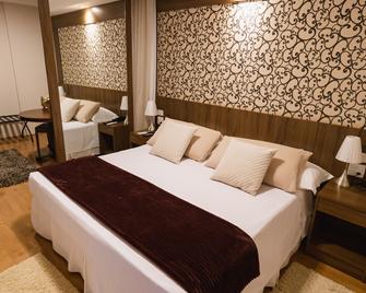 Jr Hotel Ribeirão Preto - ריבראו פרטו - חדר שינה