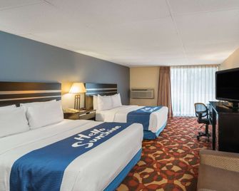 Days Inn by Wyndham Carlisle North - Carlisle - Спальня