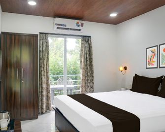 Hotel O Birds Valley Resort - Hinjewadi - Schlafzimmer