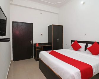 Hotel O Mid Town Ojus Tower - Rudrapur - Bedroom