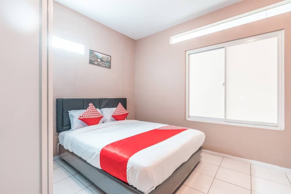 J&b Rooms Pramuka Jakarta Mitra RedDoorz - Jakarta - Bedroom