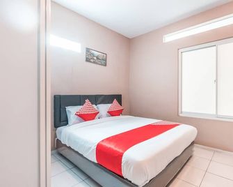 J&b Rooms Pramuka Jakarta Mitra RedDoorz - Jakarta - Bedroom