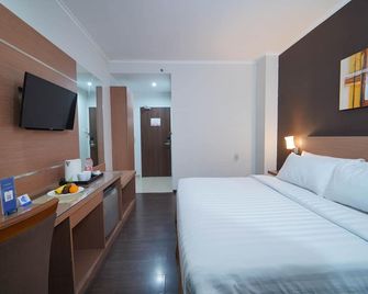 Noola Hotel Cilacap - Cilacap - Ložnice