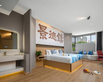 Jingdezhen Qinghui Nuanju Hotel (Taoxichuan Branch) - Jingdezhen - Bedroom