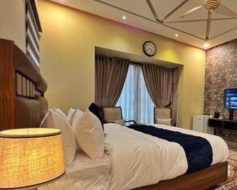 Rhodium Boutique Hotel - Islamabad - Bedroom