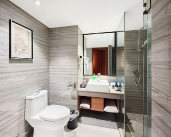 Super 8 by Wyndham Zhengzhou Railway Station Square - Zhengzhou - Habitación