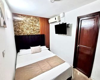 Hotel Bahia Suite - Santa Marta - Phòng ngủ