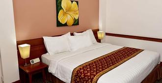 Abadi Suite Hotel & Tower - Jambi - Bedroom