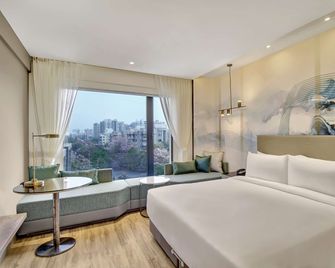 Park Inn by Radisson Surat - Surat - Schlafzimmer