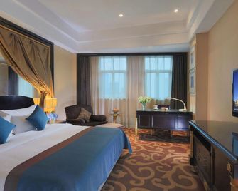 Dongguan Silver World Garden Hotel - Dongguan - Slaapkamer
