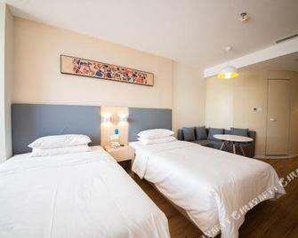 Hanting Hotel Zhangjiakou Wuyi Road - Zhangjiakou - Bedroom
