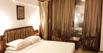 Hotel Arch Manor - Bhopal - Yatak Odası