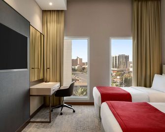 فندق رمادا باي ويندهام الرياض طريق الملك فهد - الرياض - غرفة نوم