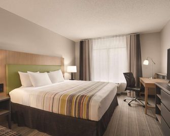 Country Inn & Suites by Radisson RaleighDurham Air - Morrisville - Schlafzimmer