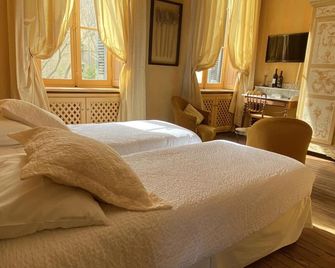 B&B Demeure Saint Louis - קרקסון - חדר שינה