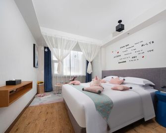 Lanmei Boutique Hotel (Lanzhou Xiyuan) - Lanzhou - Schlafzimmer