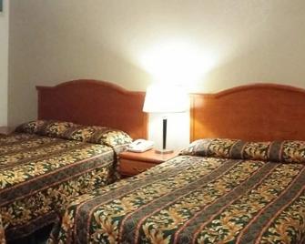 Country Inn Motel - Oakdale - Bedroom