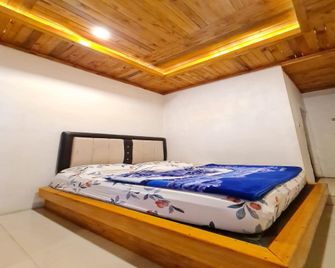 Penginapan Kamuna Garden 1 - Berastagi - Camera da letto