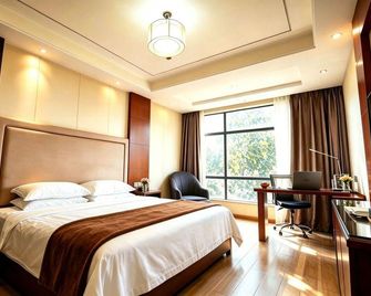 Starway Hotel (Jiujiang Railway Station) - Jiujiang - Bedroom
