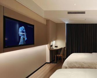 Haitian Garden Hotel - Yantai - Habitación