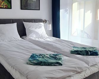 Apartamenty Dębowa 3 - פולניצה זדרוי - חדר שינה