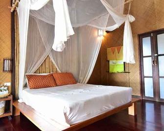 Coco Cottage Resort - Ko Ngai - Schlafzimmer