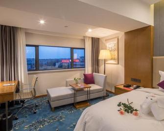 Xinhua Hotel (Chongqing Jiangbei Airport) - Chongqing - Bedroom
