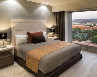 Real Inn San Luis Potosi - סן לואיס פוטוסי - חדר שינה