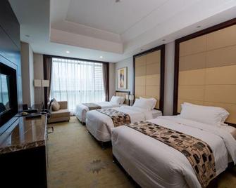 Sunwu Hot Spring International Hotel - Binzhou - Bedroom