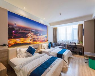 Hanting Premium Hotel Youjia Nanjing Olympic Sports Center - Nanjing - Bedroom