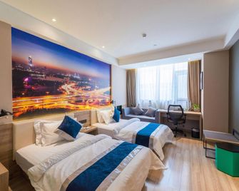 Hanting Premium Hotel Youjia Nanjing Olympic Sports Center - נאנז'ינג - חדר שינה