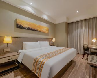 Home Inn Plus Nanjing Longjiang Dinghuaimen - Nanjing - Bedroom