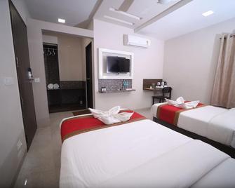 Hotel Rahul Palace Belgaum - Belgaum - Schlafzimmer