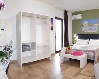 Torre Guaceto Greenblu Resort - Carovigno - Habitación