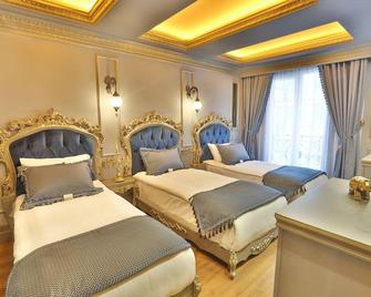 Real King Suite Hotel - Trabzon - Yatak Odası