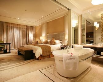 Landison Hotel Xinchang - Shaoxing - Slaapkamer