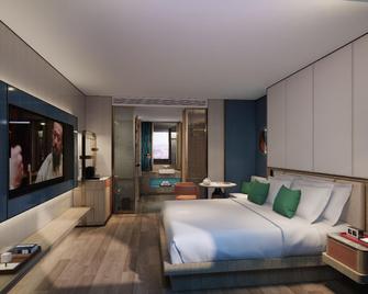 Xichang Lushan Boutique Hotel - Liangshan - Camera da letto
