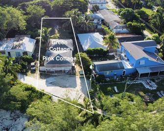 Cozy Seaside 2 Bed/2 Bath Bimini Cottage-Bay Side View -Soft Green Colored House - Alice Town - Building