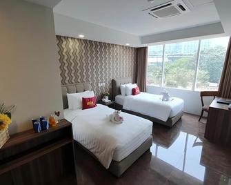 Win Premier Hotel Mangga Besar - Yakarta - Habitación