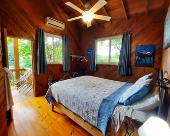 Guava Grove Resort & Villas - Sandy Bay - Bedroom