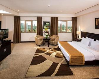 Monroe Hotel - Manama - Bedroom
