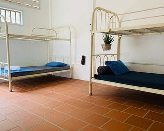 Villa Martial Arts Gym & Hostel - פנום פאן - חדר שינה