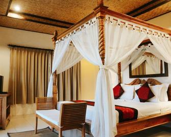 Sri Aksata Ubud Resort by Adyatma Hospitality - Ubud - Bedroom