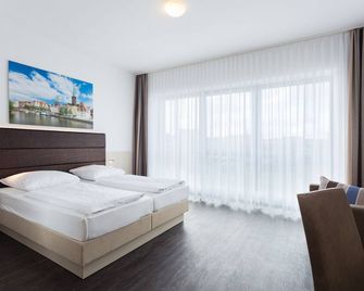 فيفا هوتل ليوبيك - وبيك - غرفة نوم