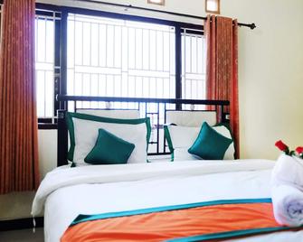 Homestay Tegal Kota by Simply Homy - Tegal - Bedroom